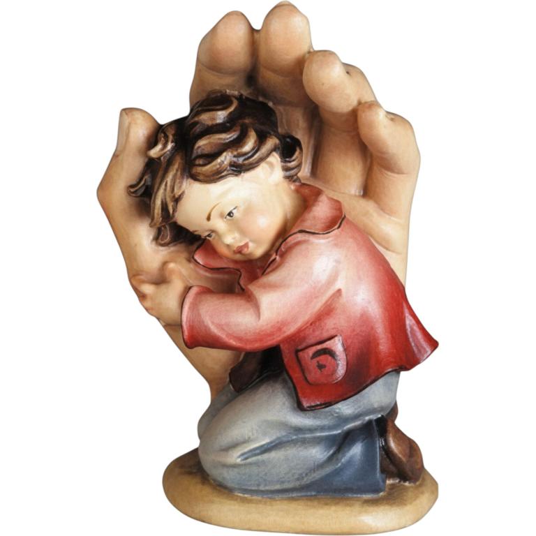 schützende hand junge holz geschnitzt kind