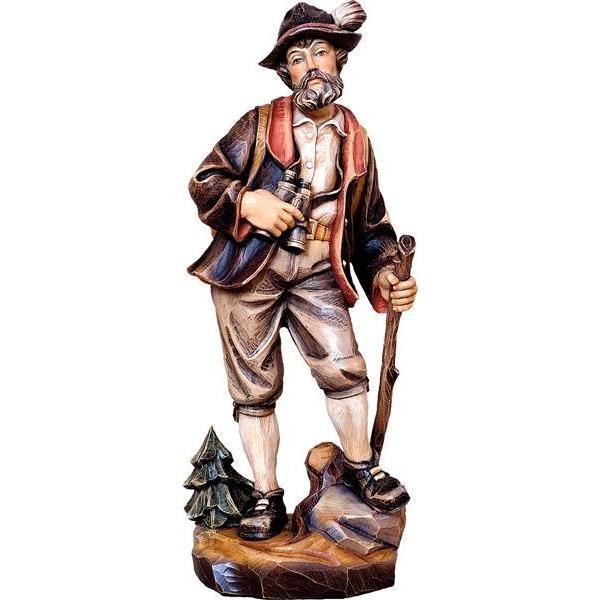 bergwanderer aus holz mit fernglas und wanderstock traditionell geschnitzt