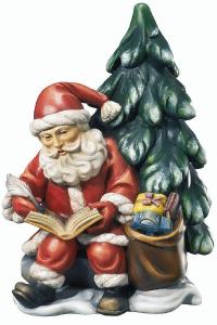 Weihnachtsmann mit Buch und Baum